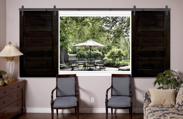 3 panel barn door shutters in family room